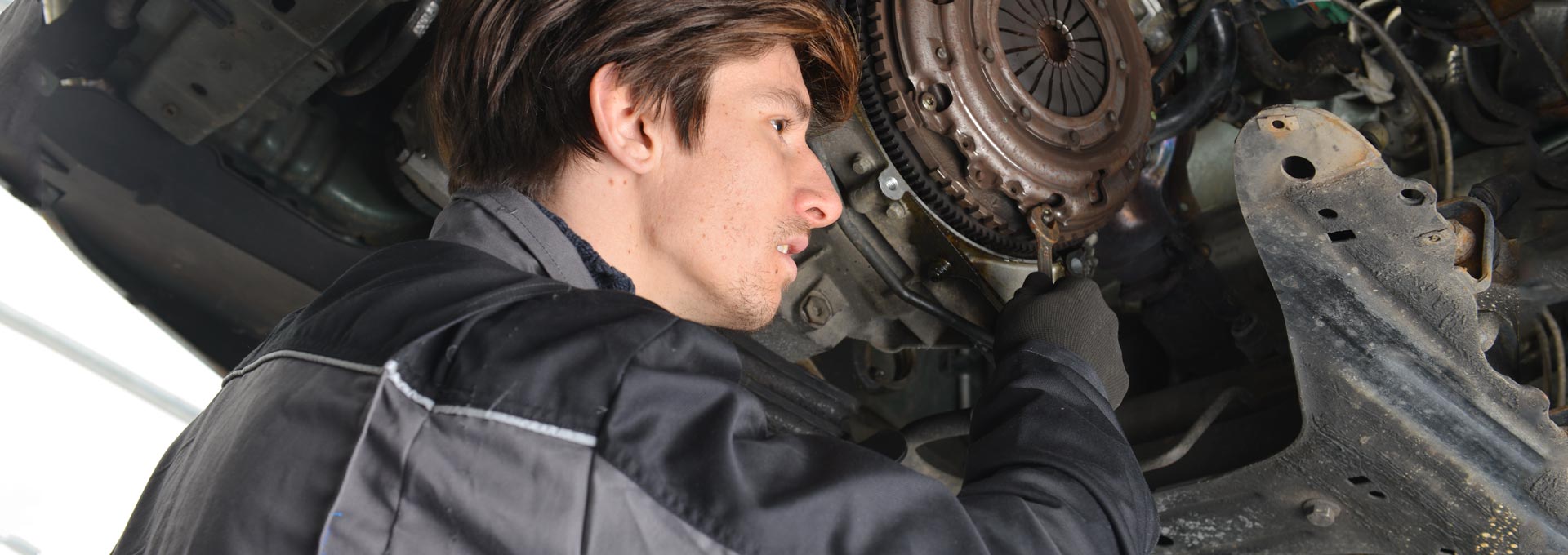 Mechanic Repairing a Car Engine